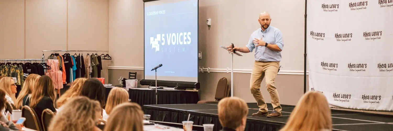 Ryan Mayfield speaking to a live audience